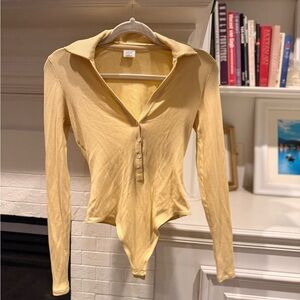 Wilfred
Charlotte Bodysuit
Long-sleeve polo bodysuit